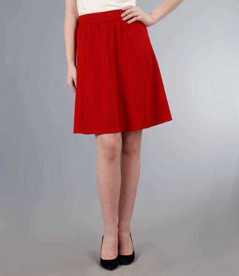 Skirt with gussets in red fabric