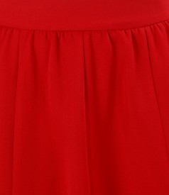 Skirt with gussets in red fabric