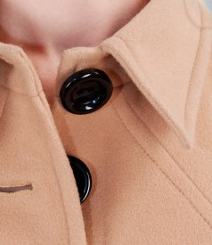 Beige coat with applied pockets