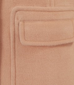 Beige coat with applied pockets