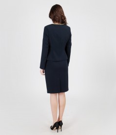 Office outfit from navy-blue elastic fabric with trim and metallic gold targets