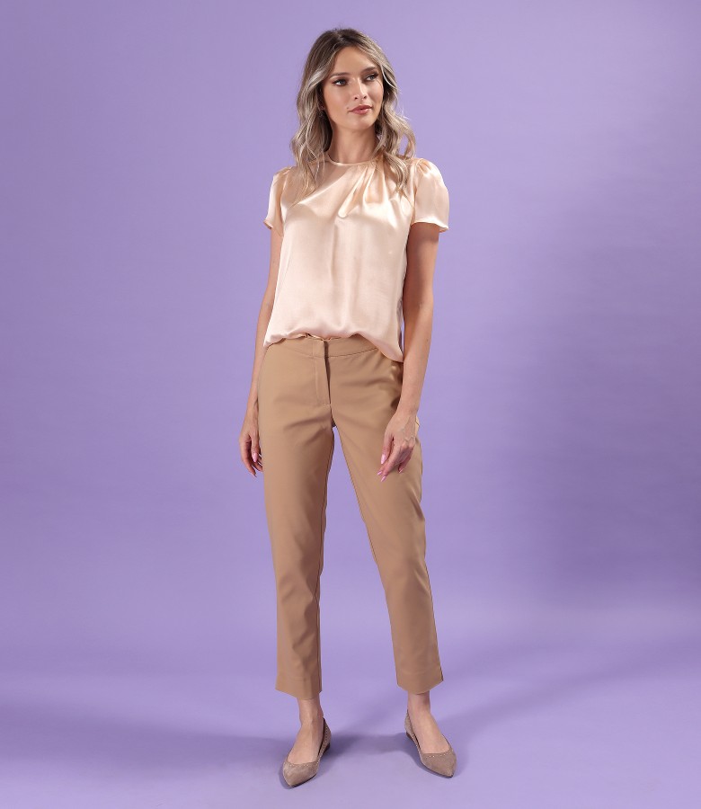 Elegant outfit with ankle pants and natural silk blouse