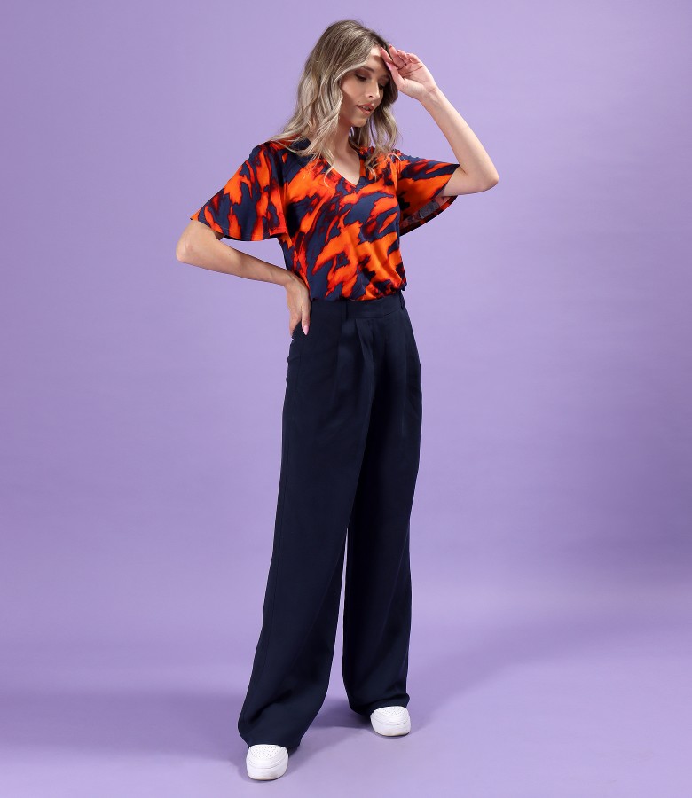 Loose pants with blouse made of elastic jersey with short sleeves