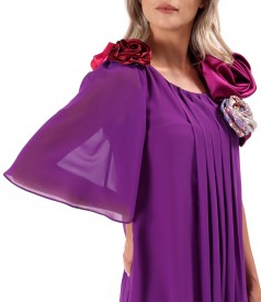 Elegant dress made of voile with satin flowers at the neckline