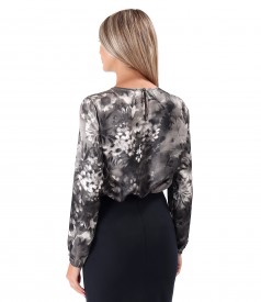 Elegant viscose satin blouse printed with floral motifs