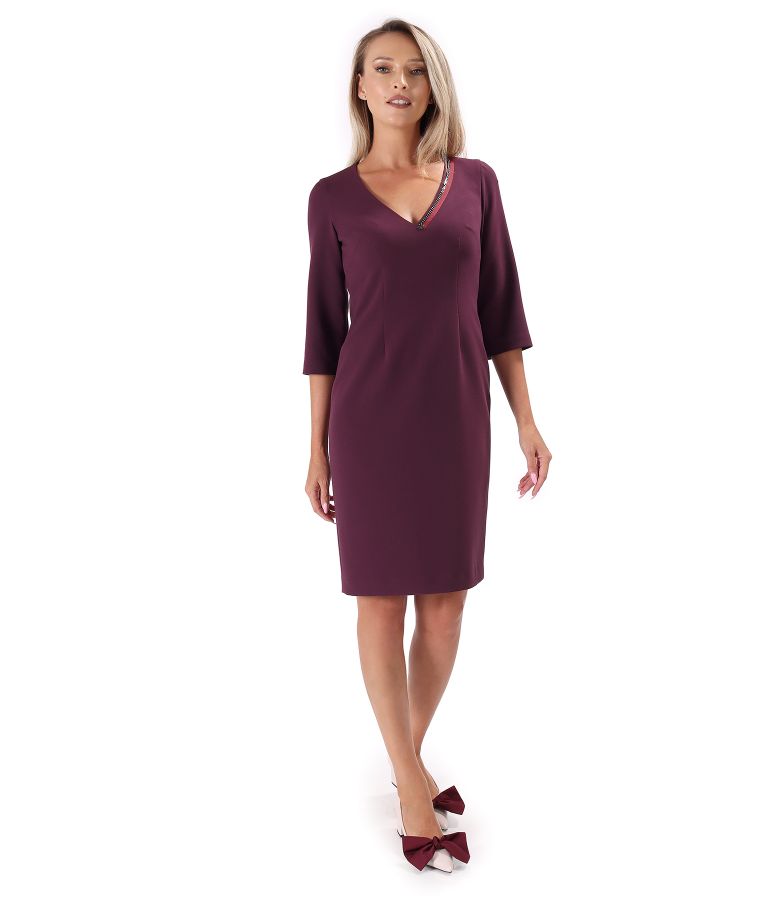 Office dress with decorative chain at the neckline