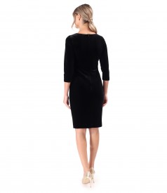 Elegant dress made of black elastic velvet with pearls at the neckline