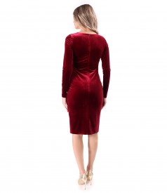 Elegant dress made of elastic velvet with pearls at the neckline