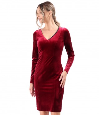 Elegant dress made of elastic velvet with pearls at the neckline