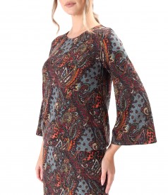 Elegant dress made of thick elastic jersey printed with paisley motifs