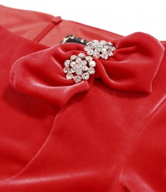 Elegant dress made of elastic velvet with crystals brooch