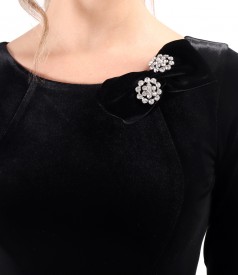 Elegant dress made of elastic velvet with crystals brooch