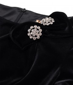 Elegant dress made of elastic velvet with crystals brooch