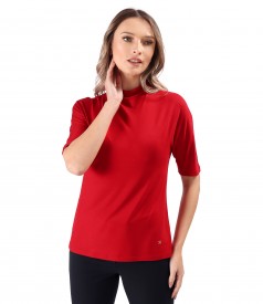 Elastic jersey blouse with decolletage on the neck