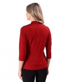 Elegant blouse made of jersey gathered at the neckline.