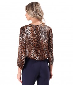 Elegant blouse made of natural silk with animal print